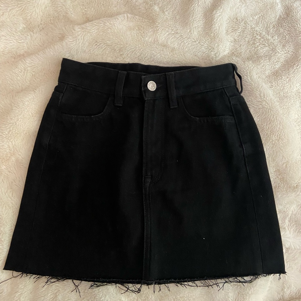 Black denim mini skirt